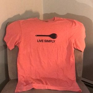 Patagonia “bright peach” T-shirt with live simply motto